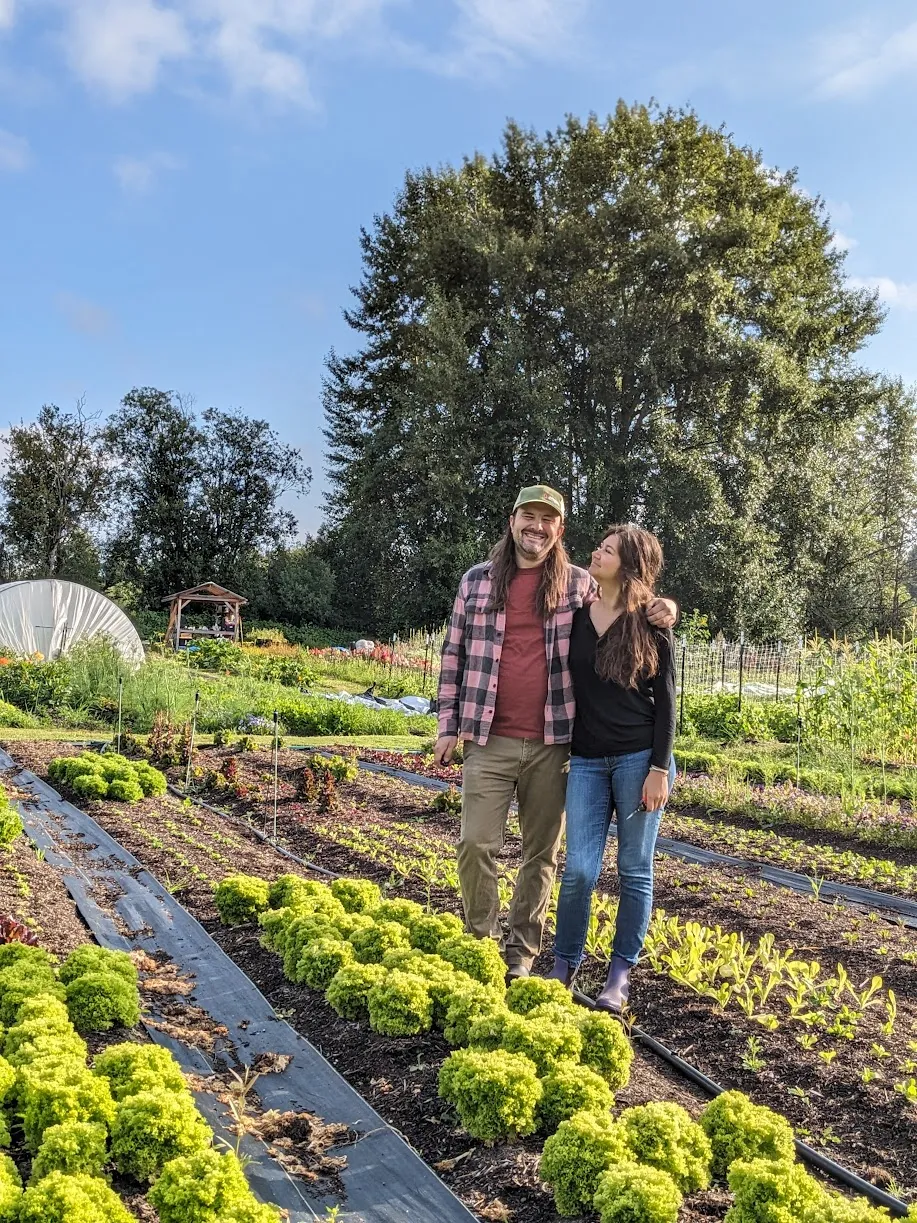 Alex and Tyler standing in their field