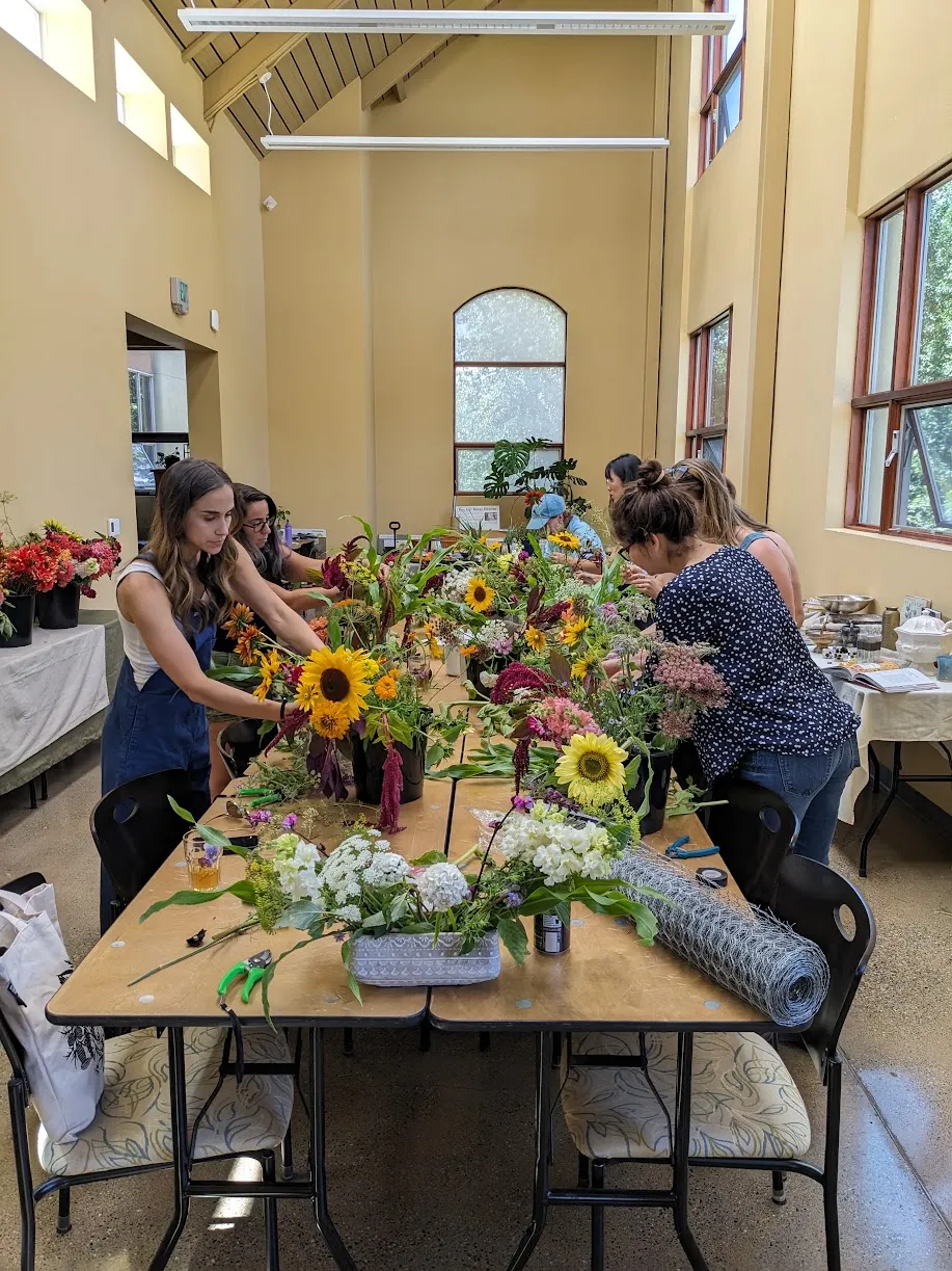 Alex leading a group of flower workshop particpants